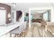 Open concept kitchen and living room, with a view into the living area and the stairs at 1156 Brockton Ct, Greenfield, IN 46140
