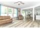 Bright living room featuring an open layout with large windows that provide lots of natural light at 1156 Brockton Ct, Greenfield, IN 46140