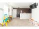 Bright loft area featuring a wall-mounted TV, an easel and plenty of space for fun and games at 1156 Brockton Ct, Greenfield, IN 46140