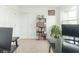 Well-lit office area with a built-in bookcase and neutral tones, perfect for a productive workspace at 1156 Brockton Ct, Greenfield, IN 46140