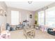 Bright playroom with toys, storage, and table providing an area for entertainment at 1156 Brockton Ct, Greenfield, IN 46140