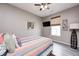 Bedroom featuring a ceiling fan, and luxury vinyl flooring, and a tv on the wall at 1187 Blackthorne S Trl, Plainfield, IN 46168