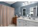 Bathroom featuring double sinks with a shower curtain and a vintage decor at 1201 Fantail Dr, Greenwood, IN 46143
