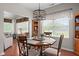 Inviting dining room with hardwood floors, natural light, and views of the outdoors at 1201 Fantail Dr, Greenwood, IN 46143