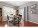 Charming dining room with hardwood floors and a stylish chandelier, perfect for Gathering gatherings at 1201 Fantail Dr, Greenwood, IN 46143