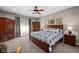 Spacious main bedroom with a king bed, ample closet space, and neutral carpeting at 1201 Fantail Dr, Greenwood, IN 46143