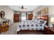 Comfortable main bedroom with large bed, stylish furnishings, and cozy carpeting at 1201 Fantail Dr, Greenwood, IN 46143
