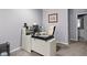 A functional office space featuring a modern desk setup with computer and sleek rolling chair at 1201 Fantail Dr, Greenwood, IN 46143
