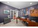 Well-lit office space with French doors, hardwood floors, and ample storage at 1201 Fantail Dr, Greenwood, IN 46143