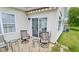 Outdoor patio with comfortable seating, perfect for enjoying the serene backyard views at 1201 Fantail Dr, Greenwood, IN 46143