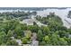 Aerial view showcases the neighborhood, a nearby marina, and access to the lake at 12214 Ridgeside Rd, Indianapolis, IN 46256