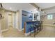 Finished basement features a wet bar with seating and a full bathroom at 12214 Ridgeside Rd, Indianapolis, IN 46256
