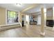 Finished basement provides access to the patio and has a fireplace and seating area at 12214 Ridgeside Rd, Indianapolis, IN 46256