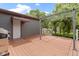Large wood back deck includes an attractive pergola and access to the home's back entrance at 12222 Cable Dr, Indianapolis, IN 46236