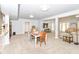 Cozy dining space with natural light and easy access to the living room and kitchen at 1302 Main St, Elwood, IN 46036