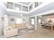 Spacious open-concept living room with seamless transition to the dining and kitchen areas at 1302 Main St, Elwood, IN 46036