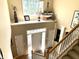 Grand two-story foyer with a staircase and chandelier, showcasing an inviting entrance to the home at 13221 Griffin Run, Carmel, IN 46033