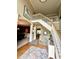 Welcoming two-story foyer with staircase, elegant details, and easy access to dining and living areas at 13221 Griffin Run, Carmel, IN 46033