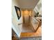 Traditional staircase showcasing the transition from hardwood to carpeted floors at 13221 Griffin Run, Carmel, IN 46033