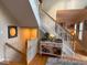 Staircase with white banisters, wooden handrail, leading to the upper floor at 13221 Griffin Run, Carmel, IN 46033