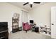 Bedroom featuring carpet flooring, a modern ceiling fan, and comfortable chair at 1331 Mccormicks Cir, Danville, IN 46122