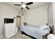 Bedroom featuring a dresser with a TV, carpet flooring, and comfortable bed with blue sheets at 1331 Mccormicks Cir, Danville, IN 46122