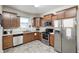 Well-equipped kitchen boasts stainless steel appliances and ample counter space at 1331 Mccormicks Cir, Danville, IN 46122