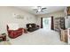 Relaxing living room featuring neutral walls and a sliding door to the outside at 1331 Mccormicks Cir, Danville, IN 46122