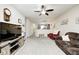 Bright, neutral living room with open access to dining room and kitchen at 1331 Mccormicks Cir, Danville, IN 46122