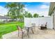 Relaxing patio area with outdoor seating and a view of the fenced backyard at 1331 Mccormicks Cir, Danville, IN 46122