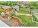 Backyard featuring a garden, a shed, and a wooden deck with a stone walkway at 1357 Brownswood Dr, Brownsburg, IN 46112