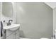 This powder room features a classic vanity with matte black faucet and a framed rectangular mirror at 1357 Brownswood Dr, Brownsburg, IN 46112