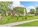 Side exterior view of a home with trees and a sidewalk at 1357 Brownswood Dr, Brownsburg, IN 46112