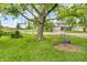 Front yard featuring a large tree with a rope swing at 1357 Brownswood Dr, Brownsburg, IN 46112