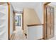 Hallway with carpeted floors and several doorways leading into other rooms of the house at 1357 Brownswood Dr, Brownsburg, IN 46112