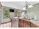 Kitchen with granite countertops, stainless steel dishwasher and eat in breakfast area at 1357 Brownswood Dr, Brownsburg, IN 46112