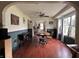 Dining room featuring hardwood floors, chandelier, a round table, and decorative windows at 1433 N Colorado Ave, Indianapolis, IN 46201