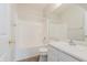 Bright bathroom with a shower-tub, vinyl floors, and vanity at 15388 Dry Creek Rd, Noblesville, IN 46060