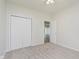 Bedroom featuring a double door closet and open doorway to another room at 15388 Dry Creek Rd, Noblesville, IN 46060