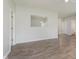 Open-concept living area with hardwood floors and views to other rooms at 15388 Dry Creek Rd, Noblesville, IN 46060