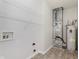 Utility room with water heater, HVAC system, and white wire shelving at 15388 Dry Creek Rd, Noblesville, IN 46060