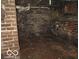 A dark basement with brick walls at 1601 Spann Ave, Indianapolis, IN 46203