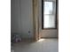 Bedroom with drywall walls and natural light at 1601 Spann Ave, Indianapolis, IN 46203