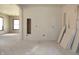 Spacious living room featuring new drywall installation and natural light, perfect for customization at 1601 Spann Ave, Indianapolis, IN 46203