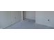 Unfinished room highlighting potential for a new design with installed electrical and prepped doorway at 1601 Spann Ave, Indianapolis, IN 46203