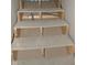 An unfinished wooden staircase, providing a blank canvas for a new staircase design at 1601 Spann Ave, Indianapolis, IN 46203