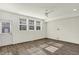 Versatile room with wood flooring, large windows, and access to an outdoor space at 16057 Coleman Dr, Westfield, IN 46074