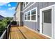 Deck featuring a grill, the exterior of the house, and a view of the surrounding area on a sunny day at 16057 Coleman Dr, Westfield, IN 46074