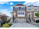 Beautiful two-story brick townhouse with a two-car garage and well-maintained landscaping at 16057 Coleman Dr, Westfield, IN 46074