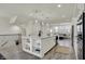Modern kitchen with a white island, stainless steel appliances, and open layout at 16057 Coleman Dr, Westfield, IN 46074